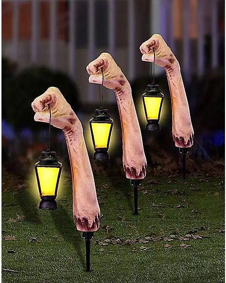Spirit Halloween LED Zombie Arm Pathway Markers 3 Pack 1 Spirit Halloween LED Zombie Arm Pathway Markers 3 Pack